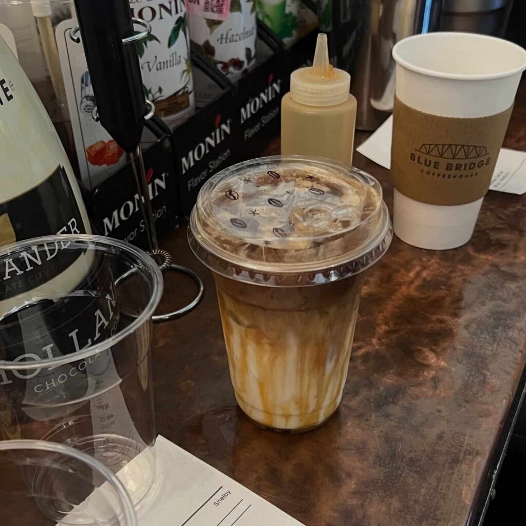 Blue-Bridge-Coffeehouse-iced-coffe-in-to-go-cup-downtown-kingsland