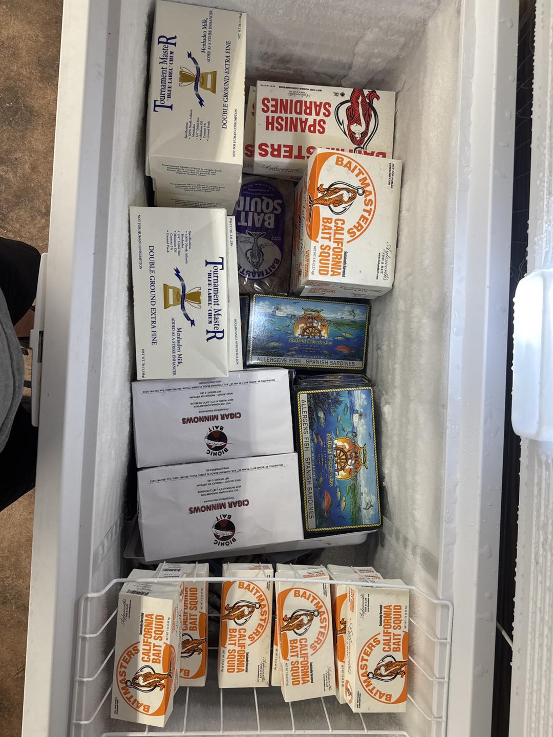 Freezer full of boxed fishing bait
