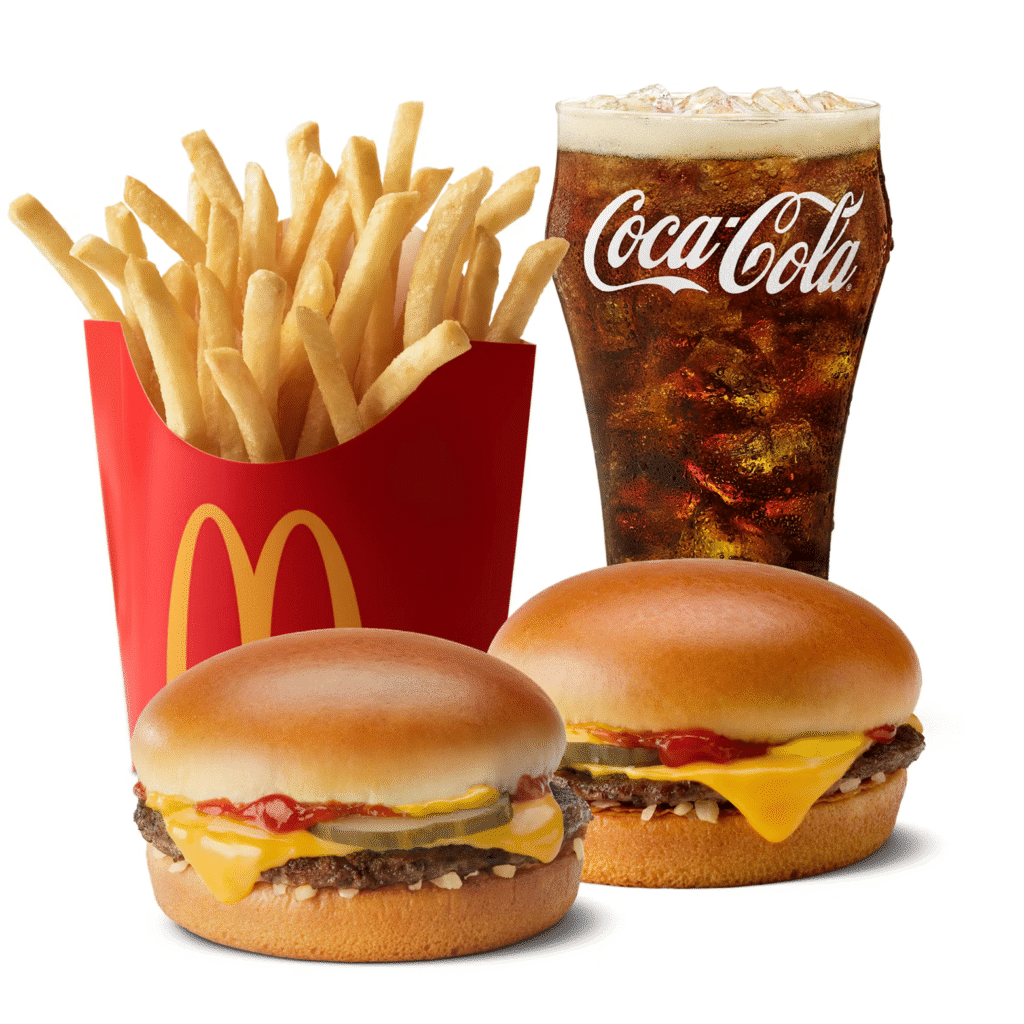 with box of fries and a Coca-cola with ice in a branded glass