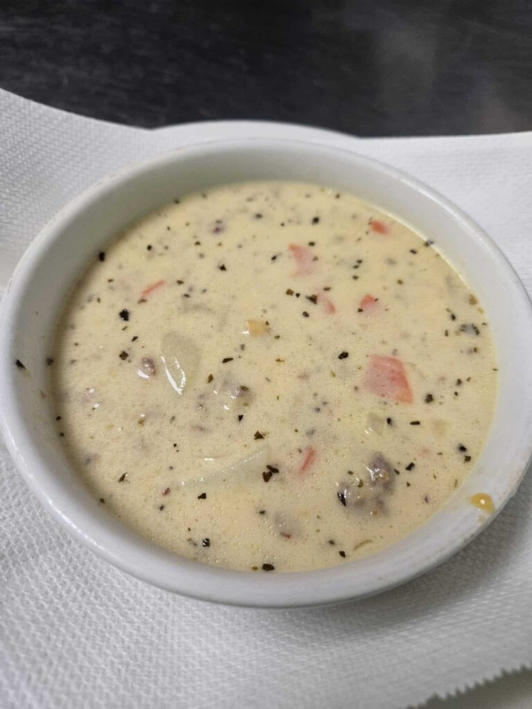 Bowl of creamy sausage potato soup from Pirates Point Bar & Grill