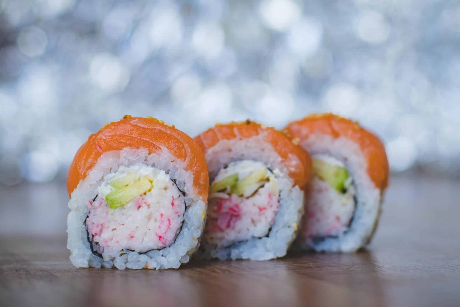 Three slices of Alaska roll maki
