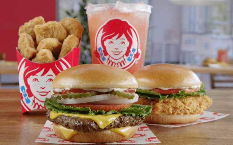 Cheesburger, fried chicken sandwich, and a drink from Wendys