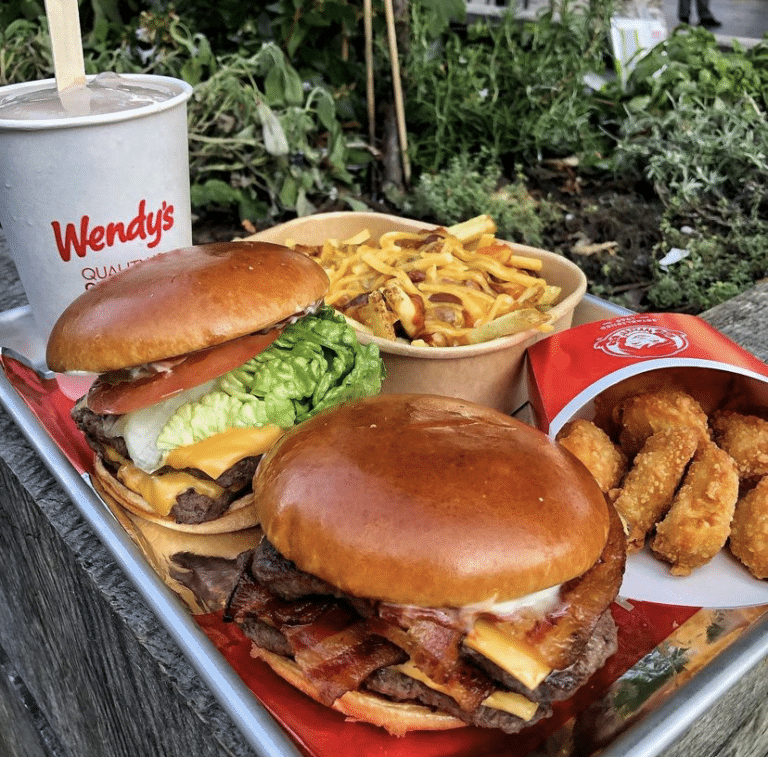 Tray with Wendy's burgers and a Frosty