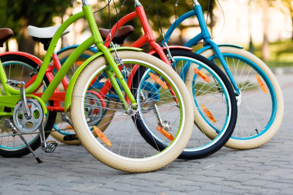 colorful bikes parked in a line