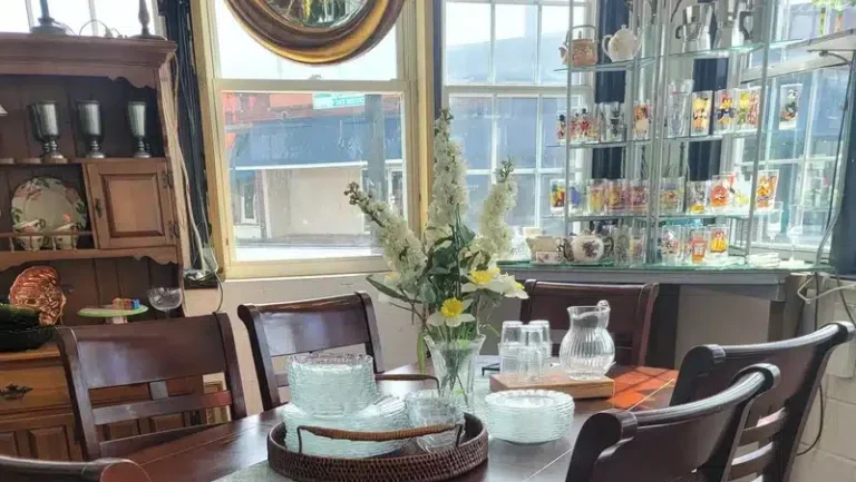 southern-shenanigans wooden table and chairs in an antique shop