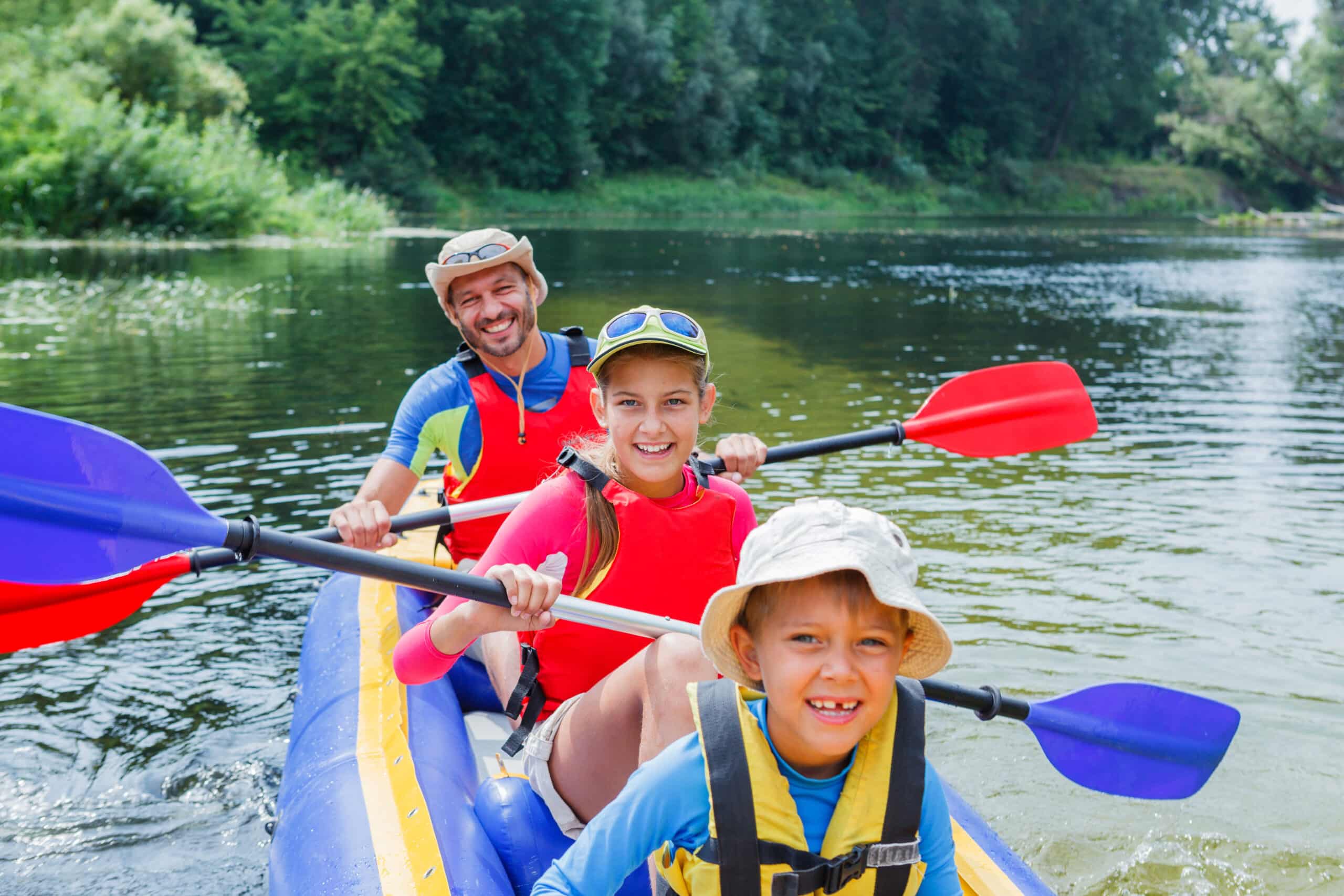 Family kayaking on the river together in Kingsland Georgia