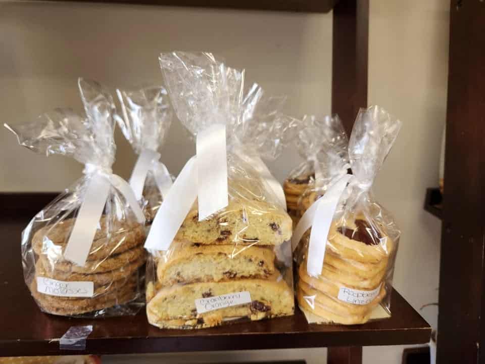 Several cellophane packages of cookies and scones