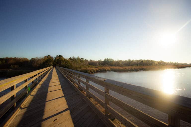 The Woodbine boardwalk at sunset in Woodbine Georgia