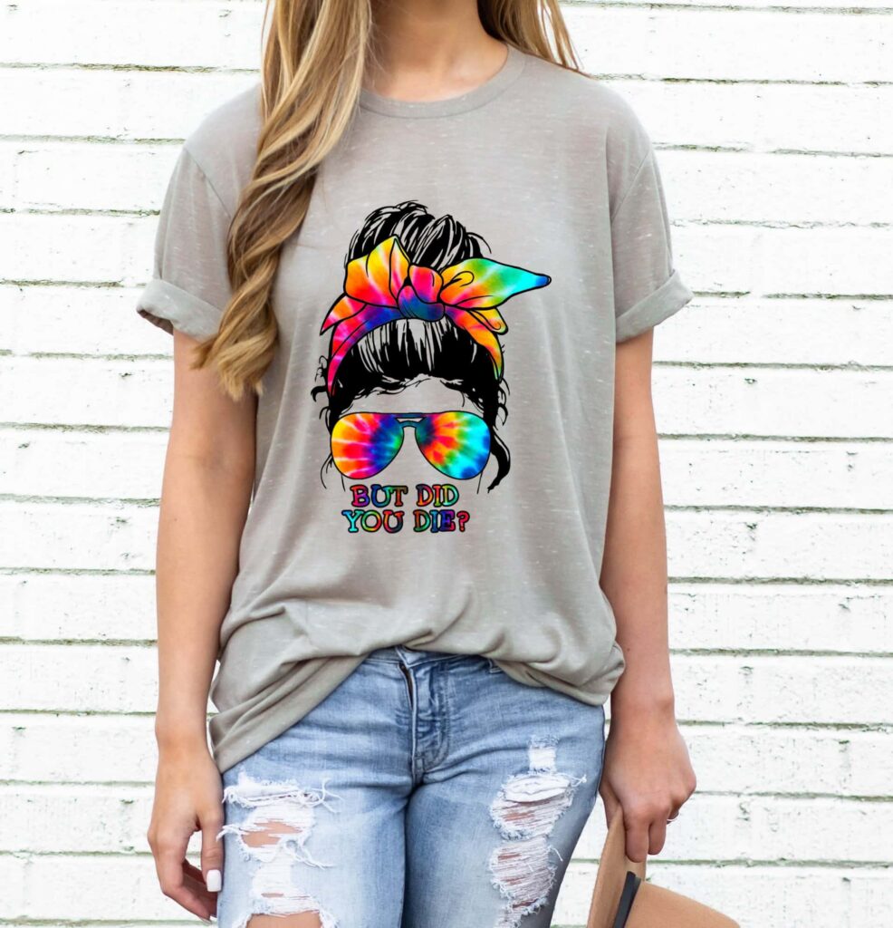 "But did you die?" gray T-shirt with tie-dye elements worn by a person with long blonde hair