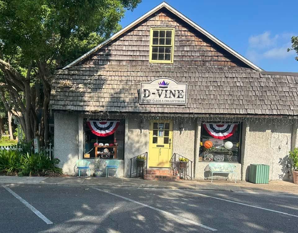 Exterior of D-Vine Sports Cards and Collectibles Building on a sunny day