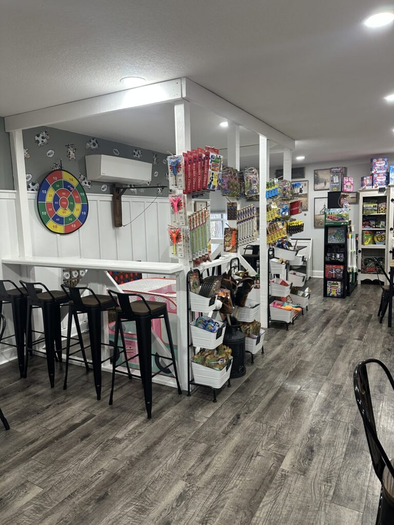 Interior showing gift merchandise and counter seating