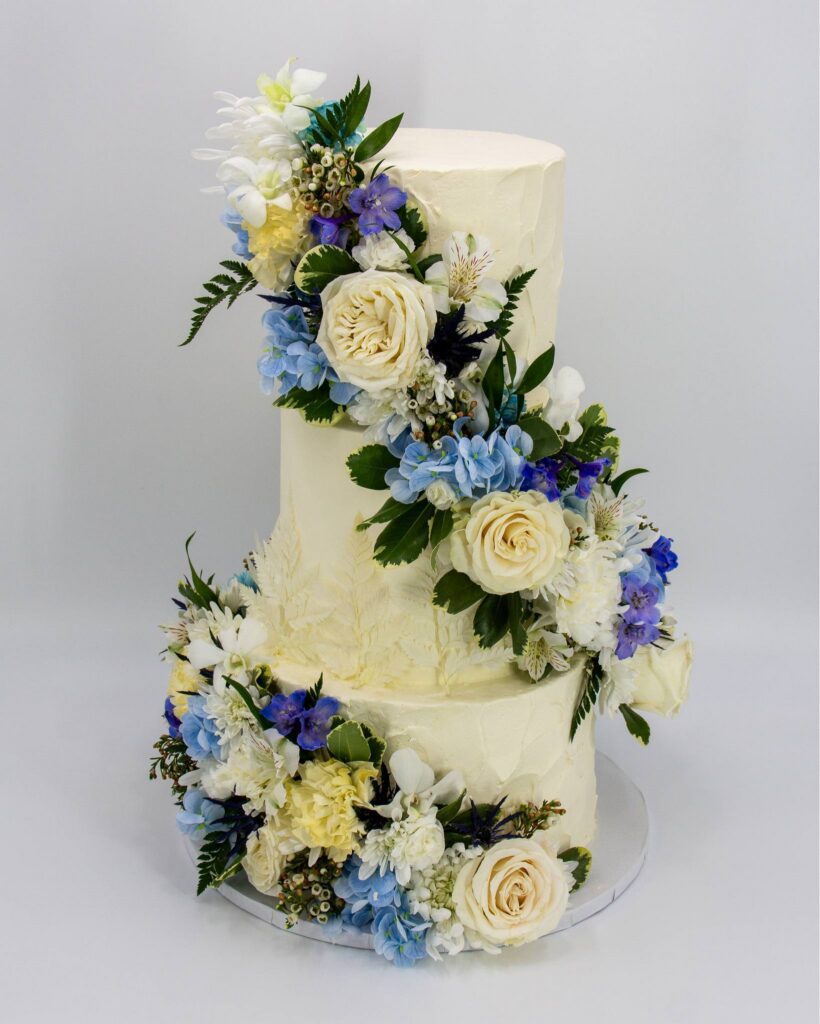 wedding-cake-with-white-and-blue-flowers-at-super-sweet-bake-shop-in-kingsland-georgia