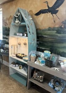 Bath and beauty products on display with a seashore theme.
