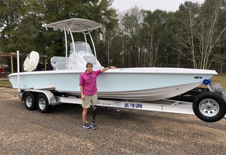 woman-posing-with-boat-fishing-charter-kingsland-georgia-no-limits-charter