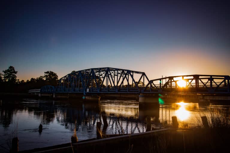 the-blue-bridge-right-at-sunset-as-the-sun-is-set-behind-the-bridge-kingsland-georgia
