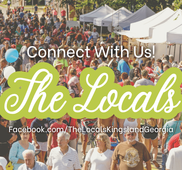 Image of a crowd of people at a festival behind the text "Connect With Us! The Locals. Facebook.com/TheLocalsKingslandGeorgia