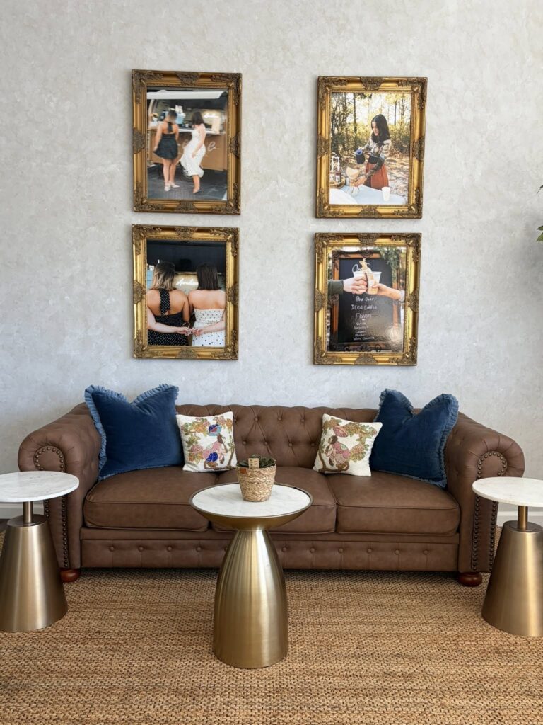 Interior of Awaken Coffee Co. Cafe with sofa and small tables