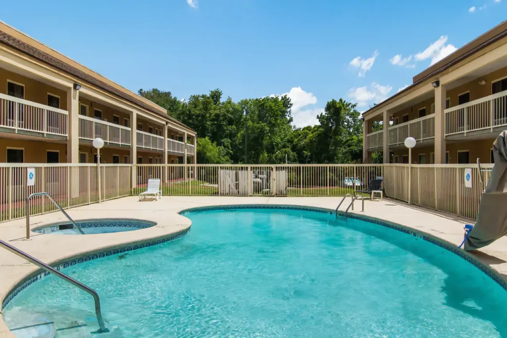 Suburban Studios Outdoor Pool and Hot Tub from website 03-19-2026