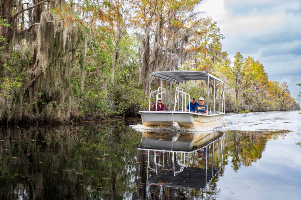 people-taking-a-guided-boat-tour-in-the-okefenokee-national-wildlife-refuge