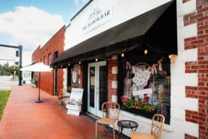 shops-in-downtown-kingsland-red-brick-road-historic-buildings