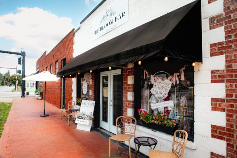 shops-in-downtown-kingsland-red-brick-road-historic-buildings
