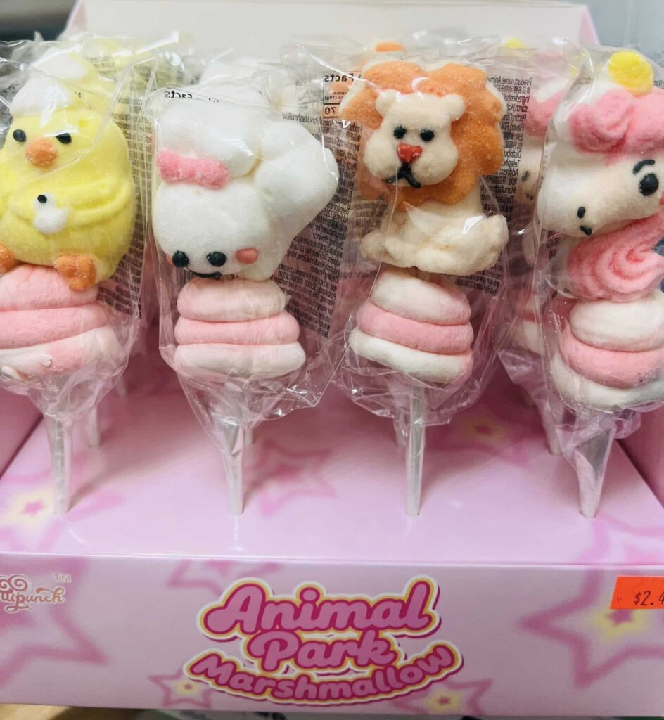 Individually wrapped Animal Park Brand marshmallow treats on sticks in a pink display box