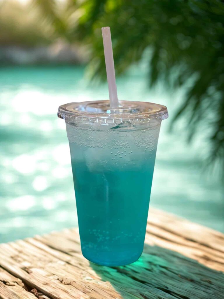 Icey Aquablossom Burst drink in a plastic cup with a lid and a straw