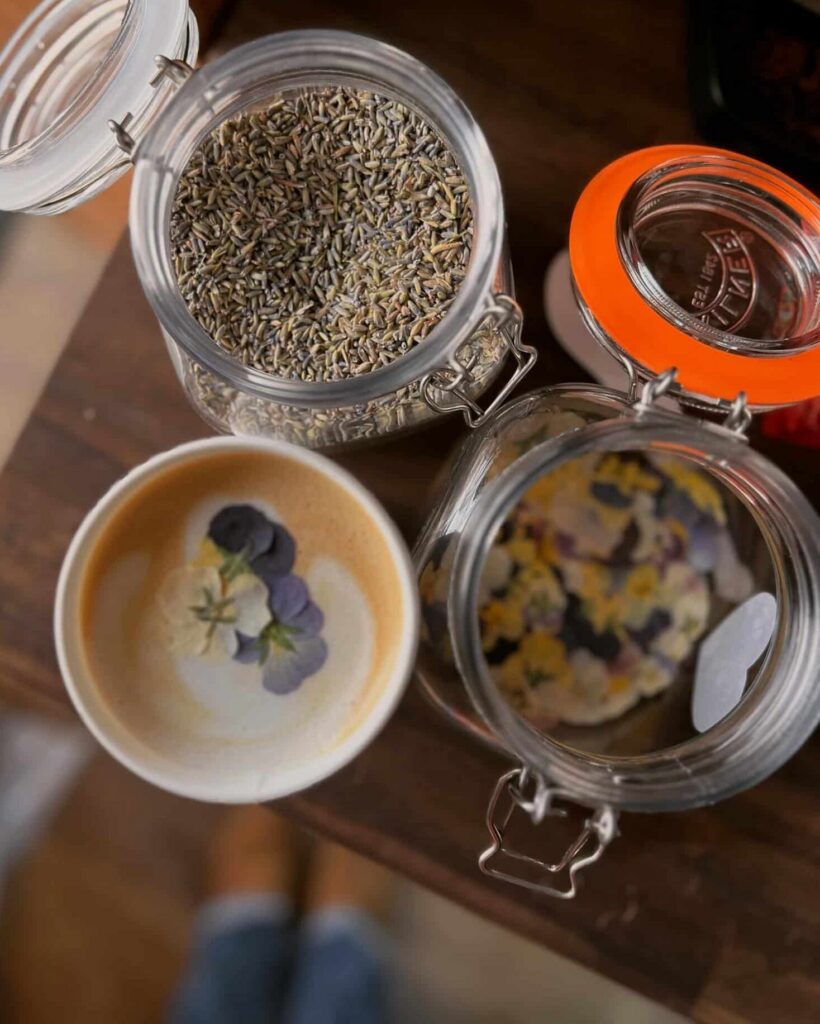 Novel Brews Chai Ingredients in jars on a table from Facebook 02-2026