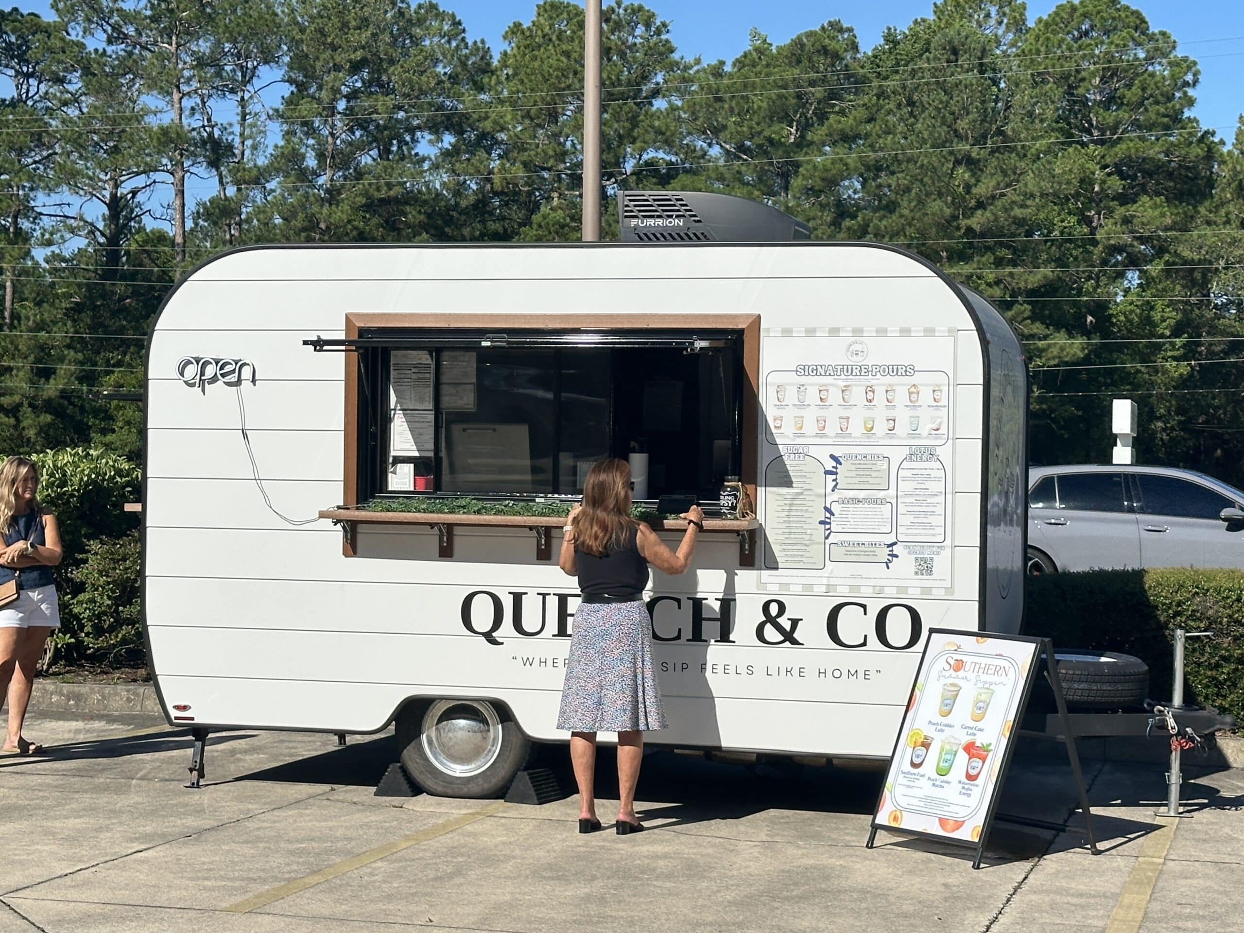 Quench & Co. Coffee Trailer with Customer