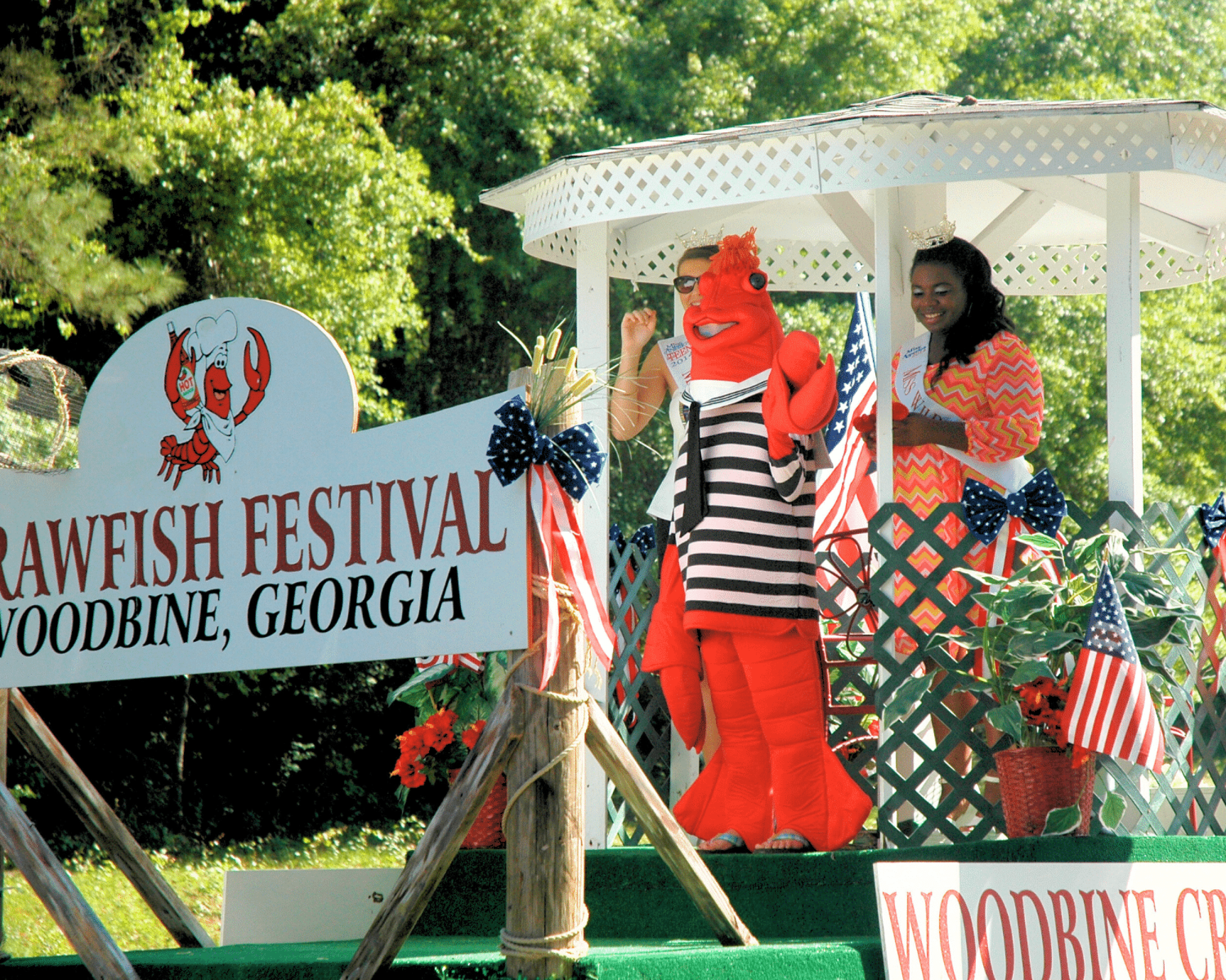 Mascot on stage at Crawfish Festival